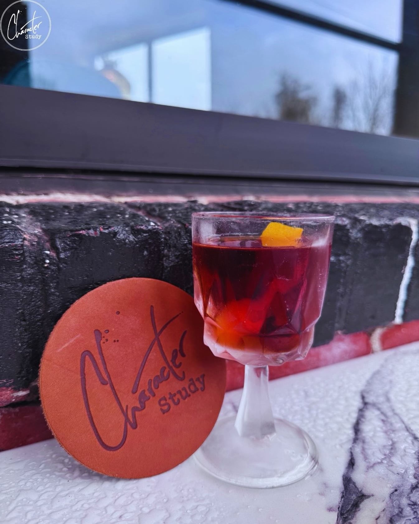 Signature drink with custom branding at Character Study