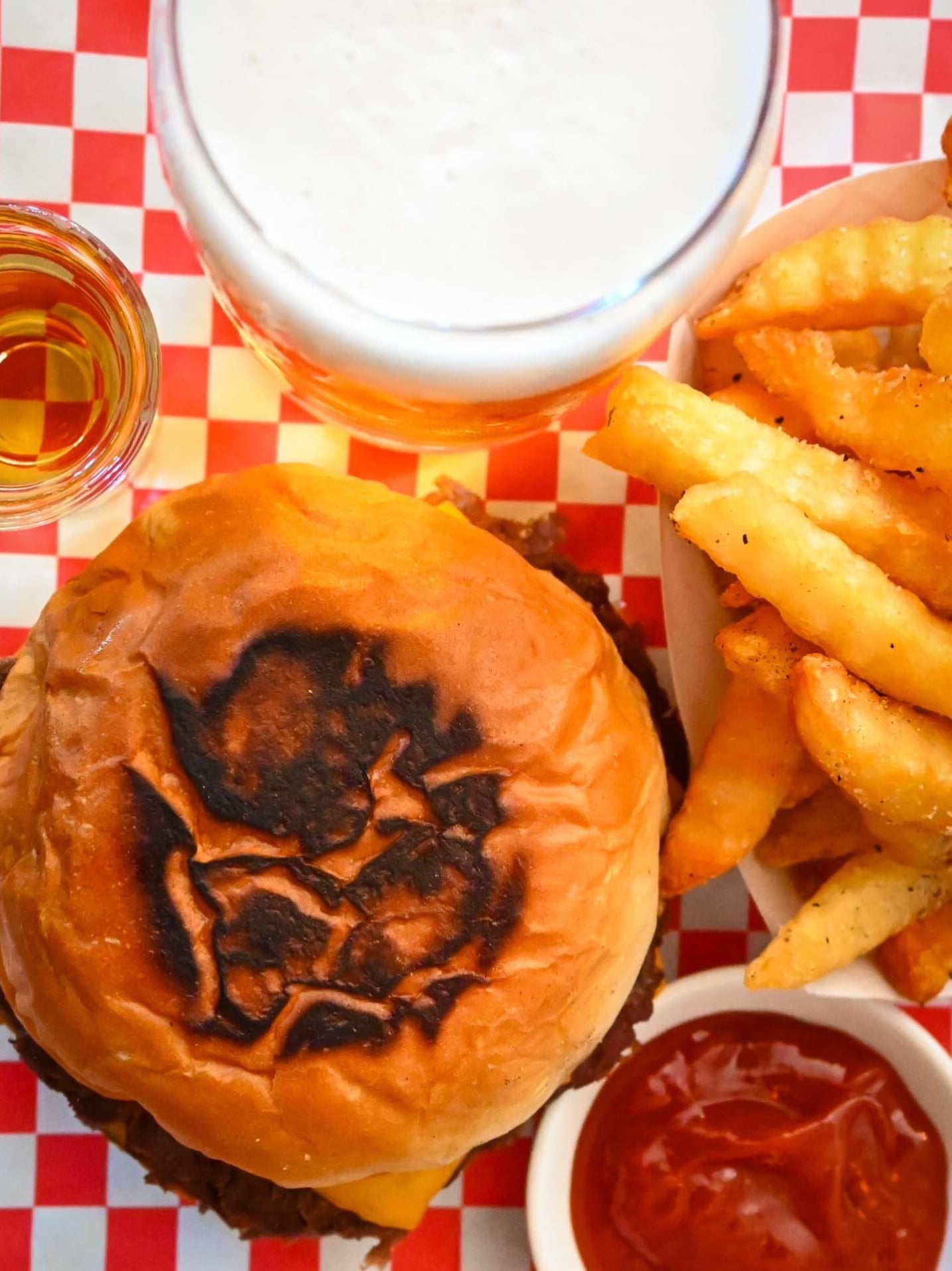 House-made burger with crispy fries and signature sauce