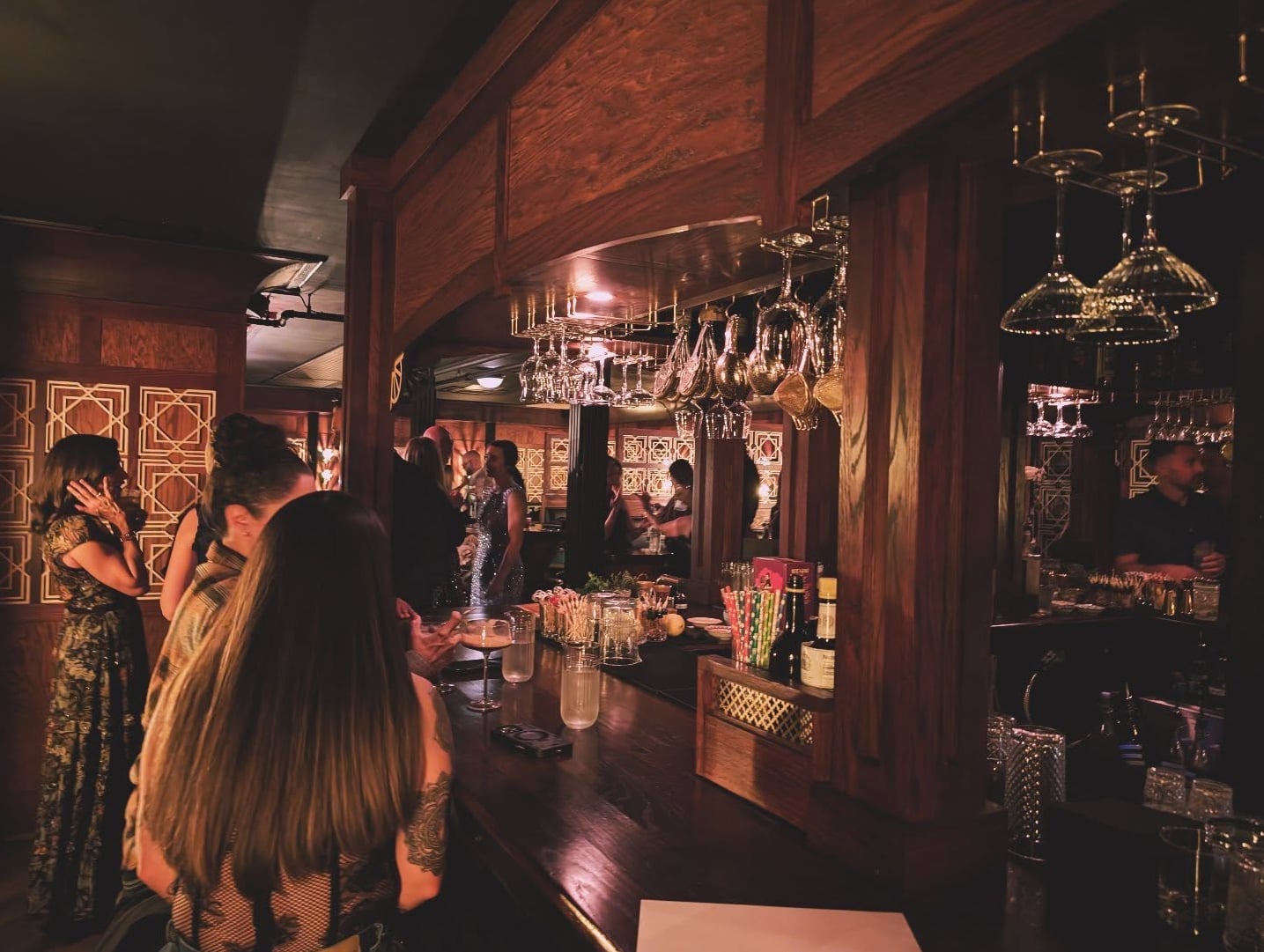 Elegant Art Deco-inspired bar interior with warm ambiance