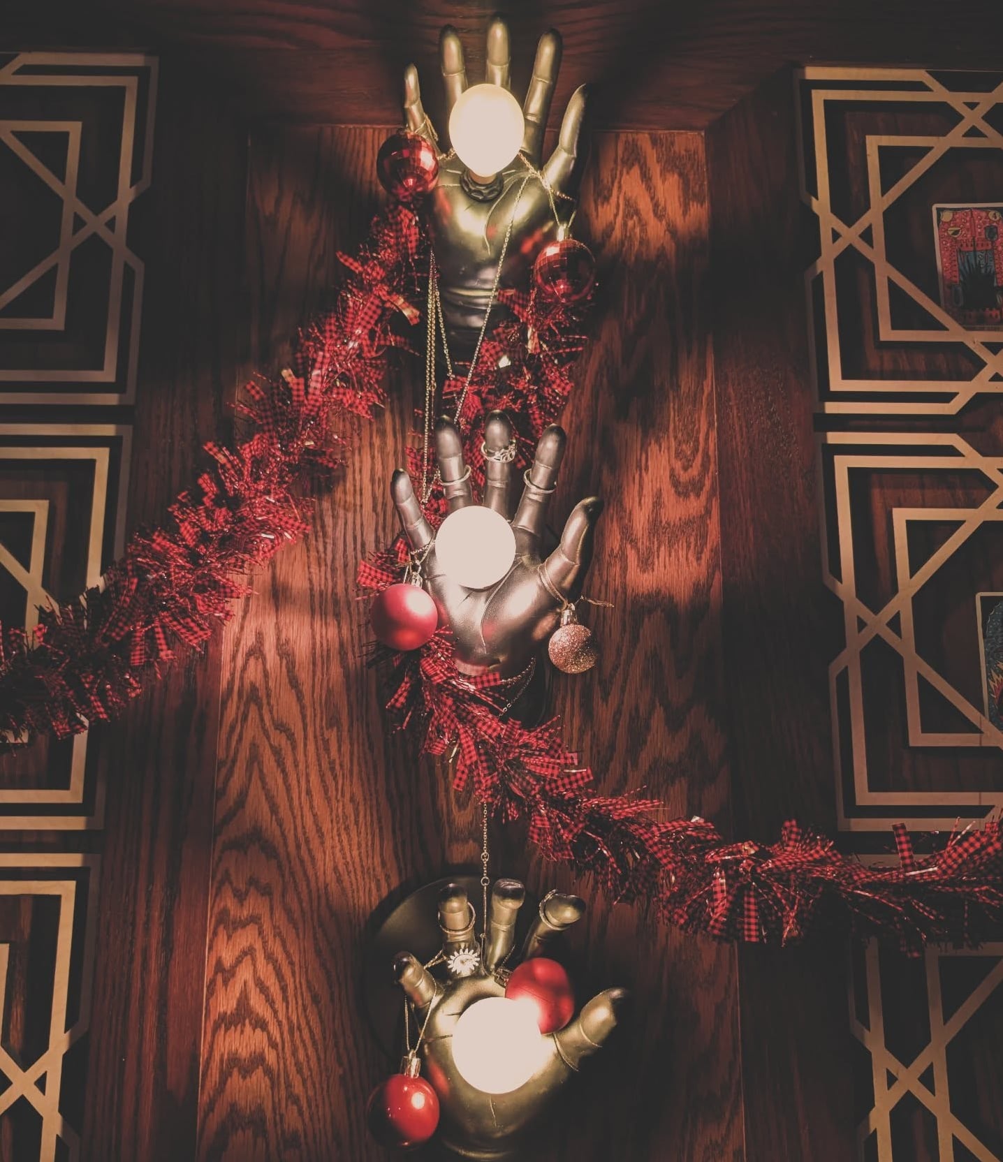 Luxe Art Deco hand sculptures with festive decor