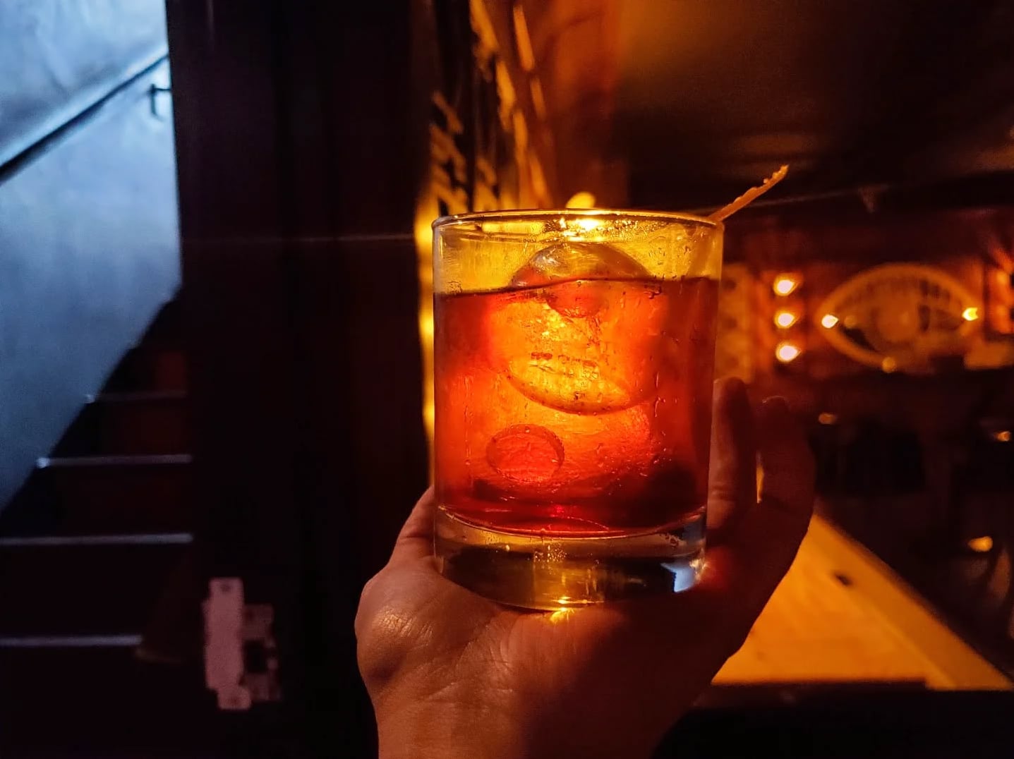 Classic whiskey sour served at the dark, intimate bar.
