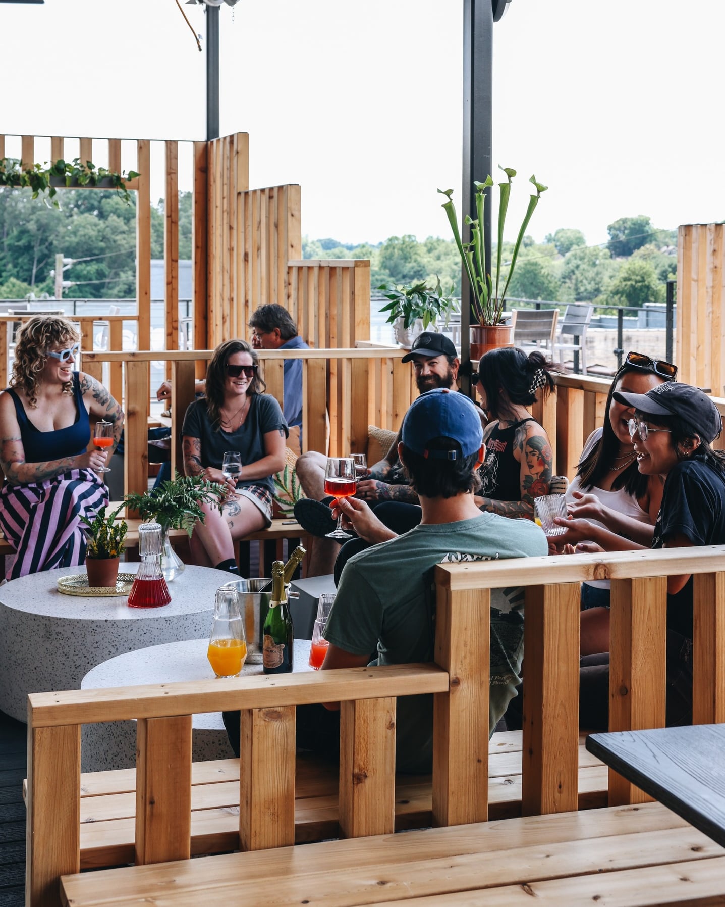 Cozy outdoor patio seating with wooden decking and inviting atmosphere.
