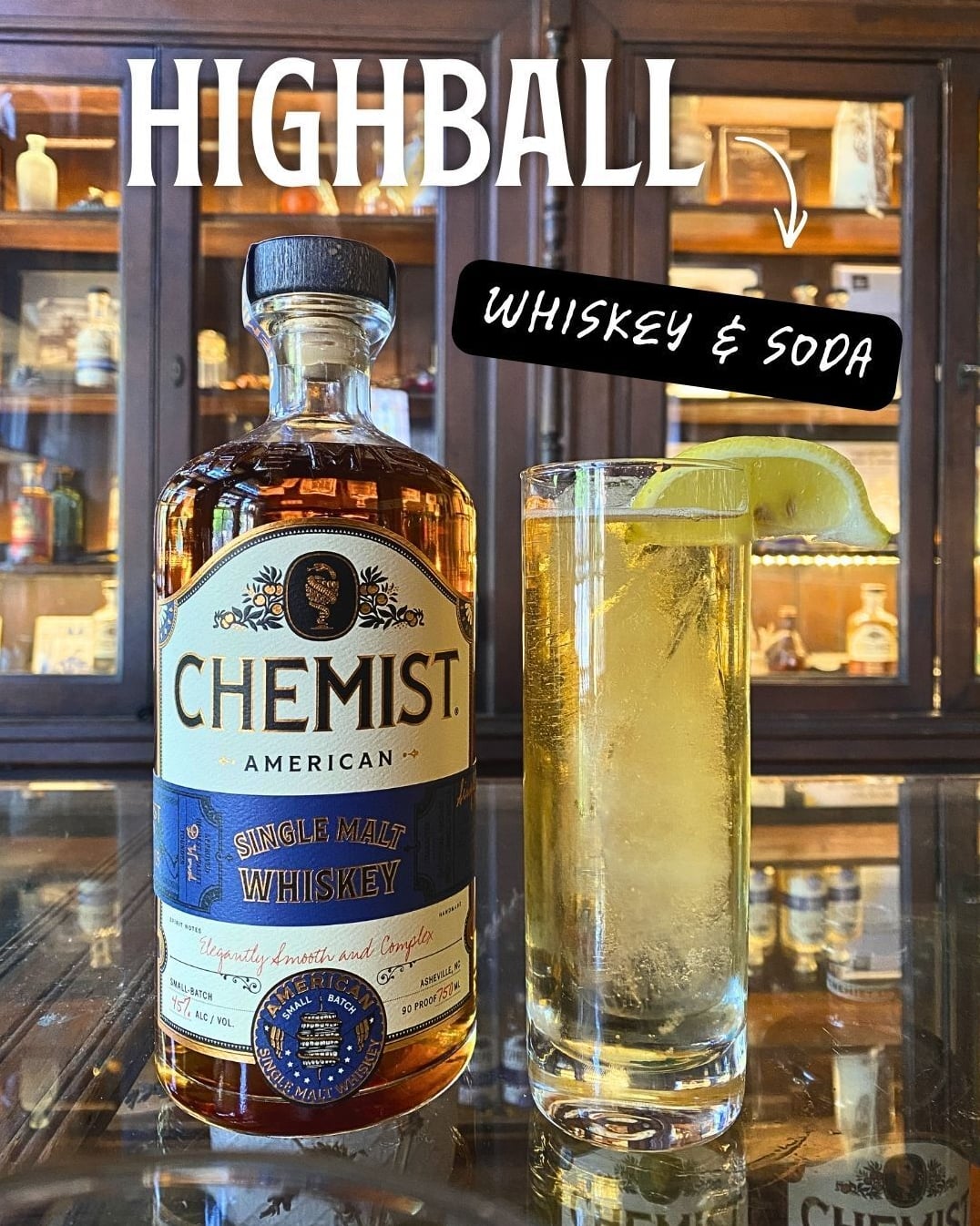 Chemist Whiskey Highball served over ice with a fresh lime wedge.