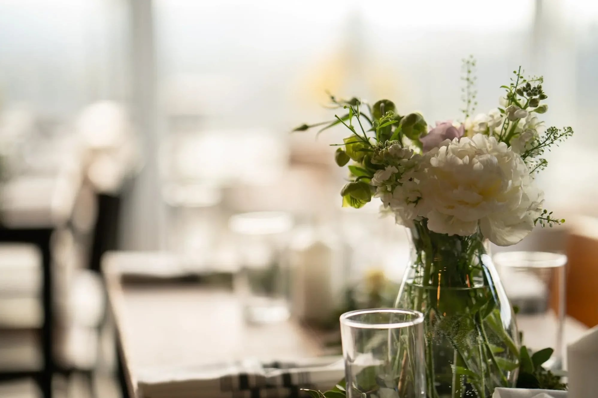 Elegant floral centerpiece on dining table.