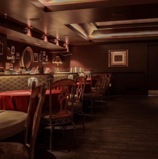 Intimate dining nook with vintage decor.