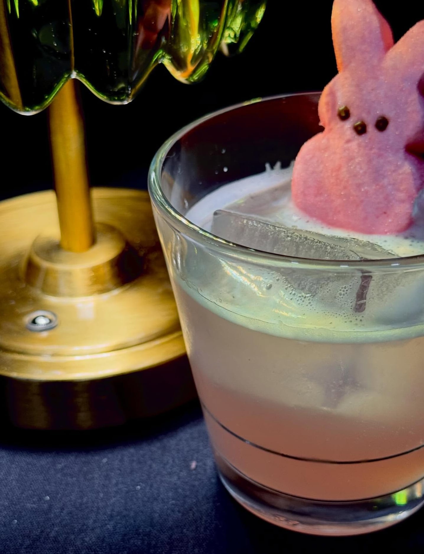 Pink bunny cocktail topped with a Peep garnish