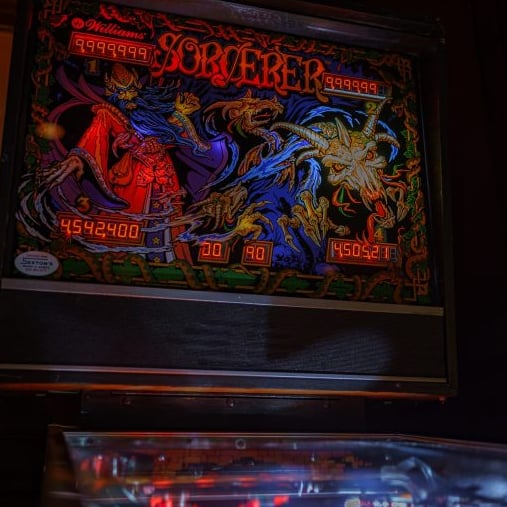 Vintage Sorcerer pinball arcade cabinet.