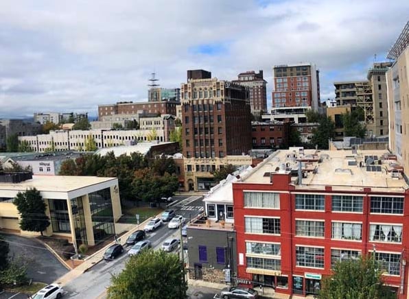 Panoramic view of the Asheville skyline from the rooftop patio