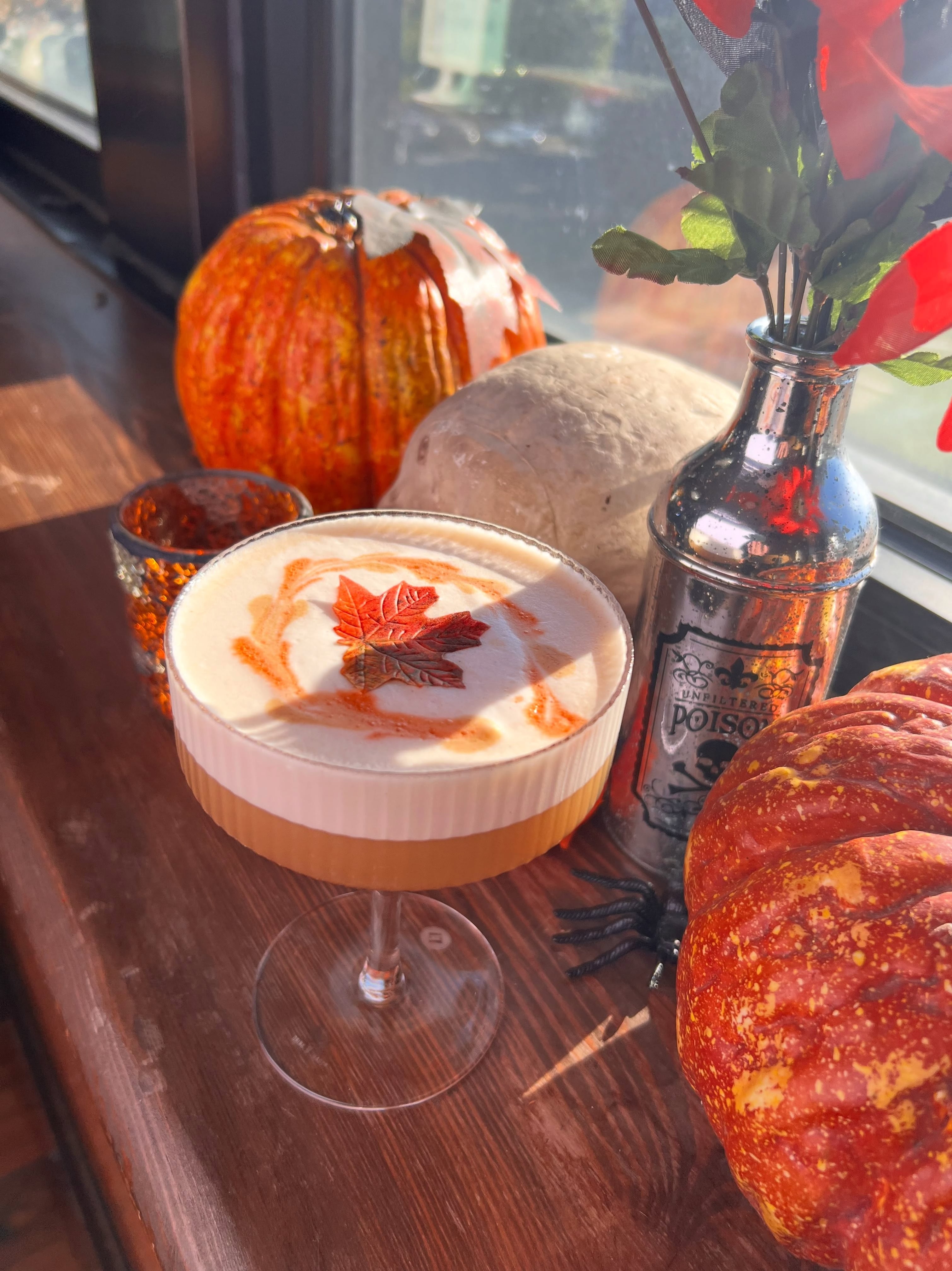 Fall sour with a maple-leaf garnish