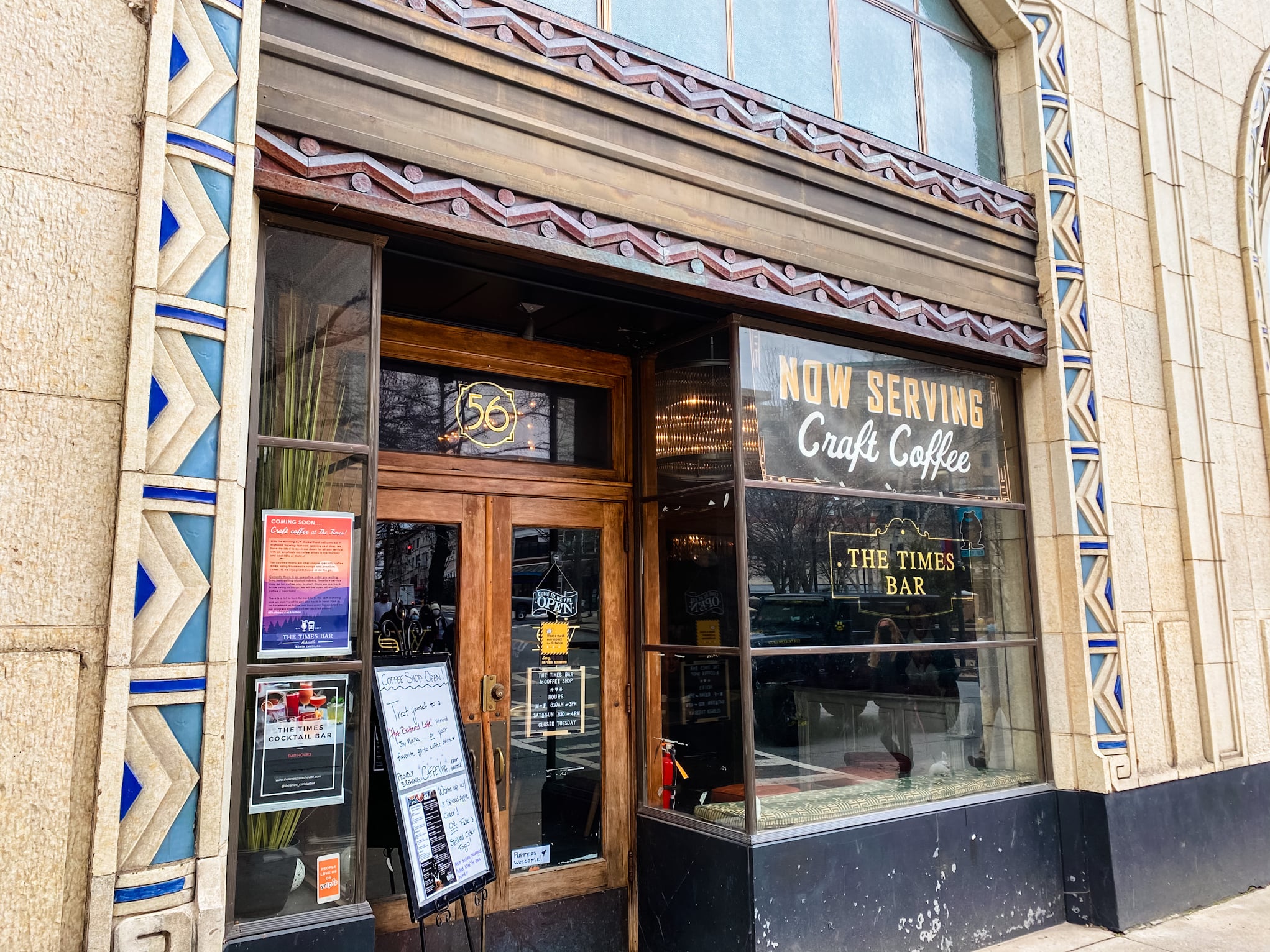 Ornate historic facade with The Times Bar signage