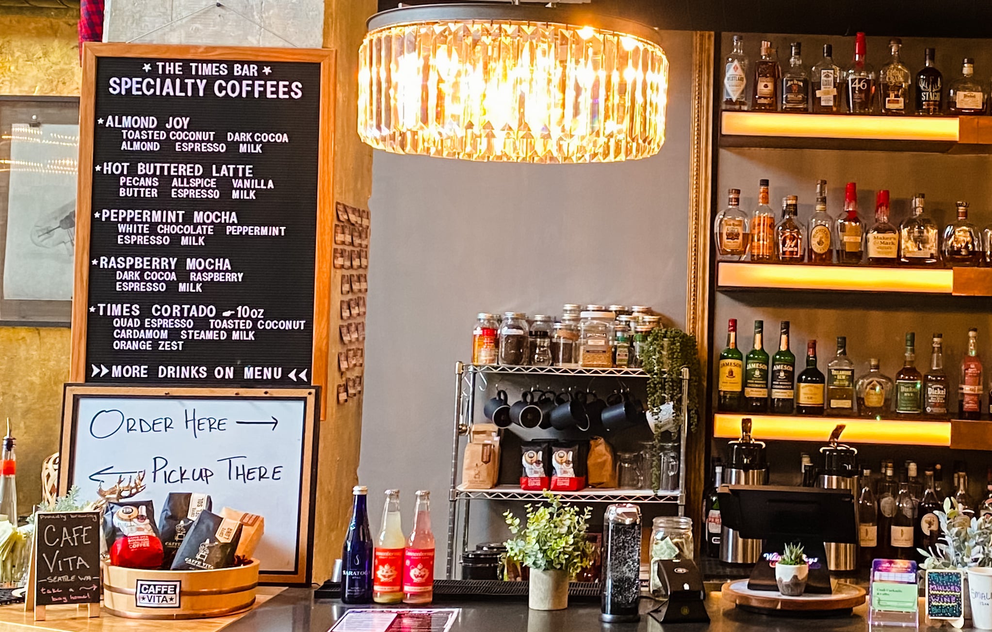 Bar counter with specialty coffees and craft cocktail selection