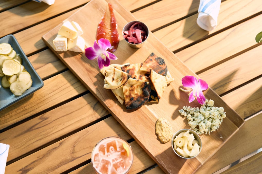 Artisanal charcuterie board with cheeses and grilled bread