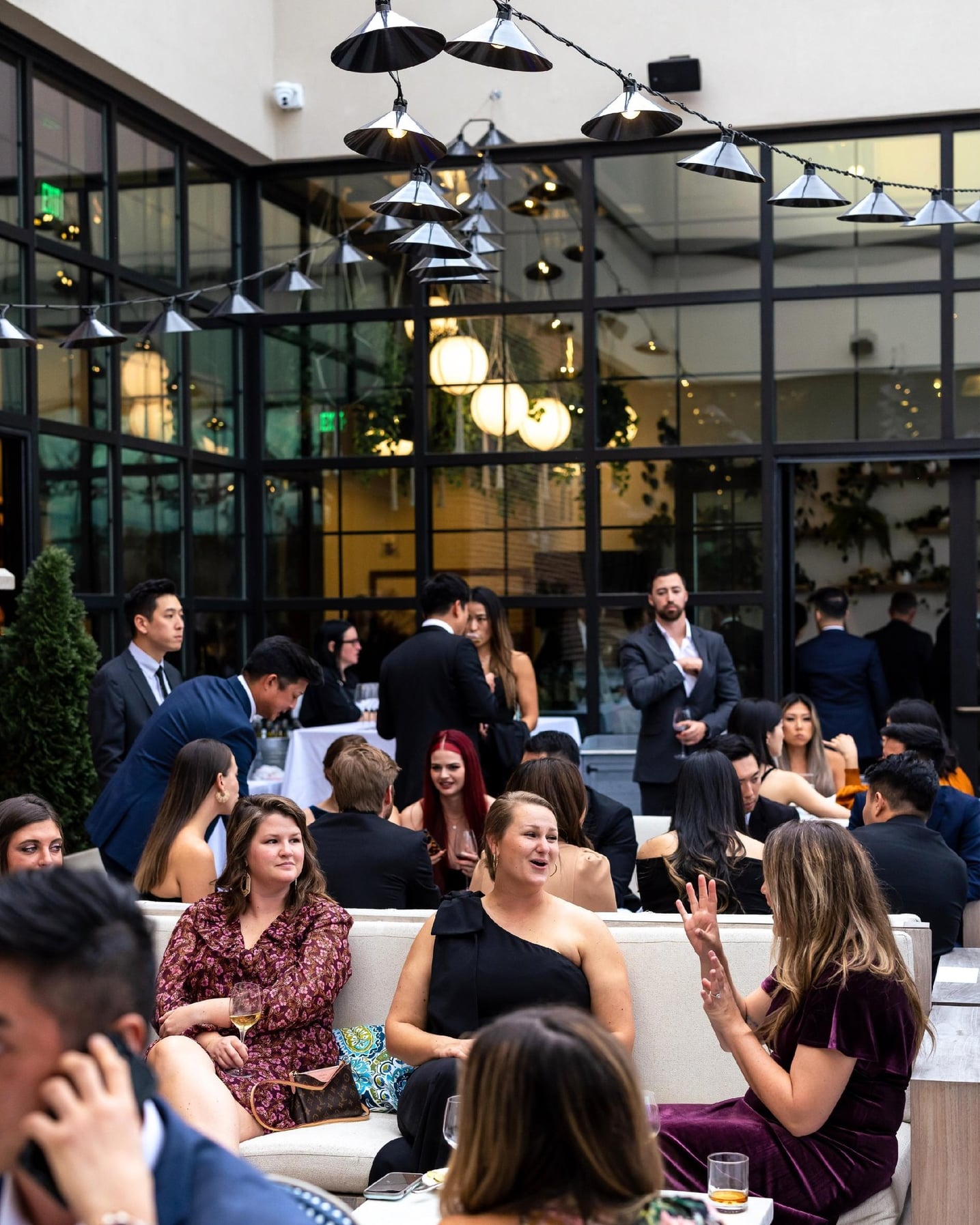 Lively social atmosphere in the stylish urban patio area.