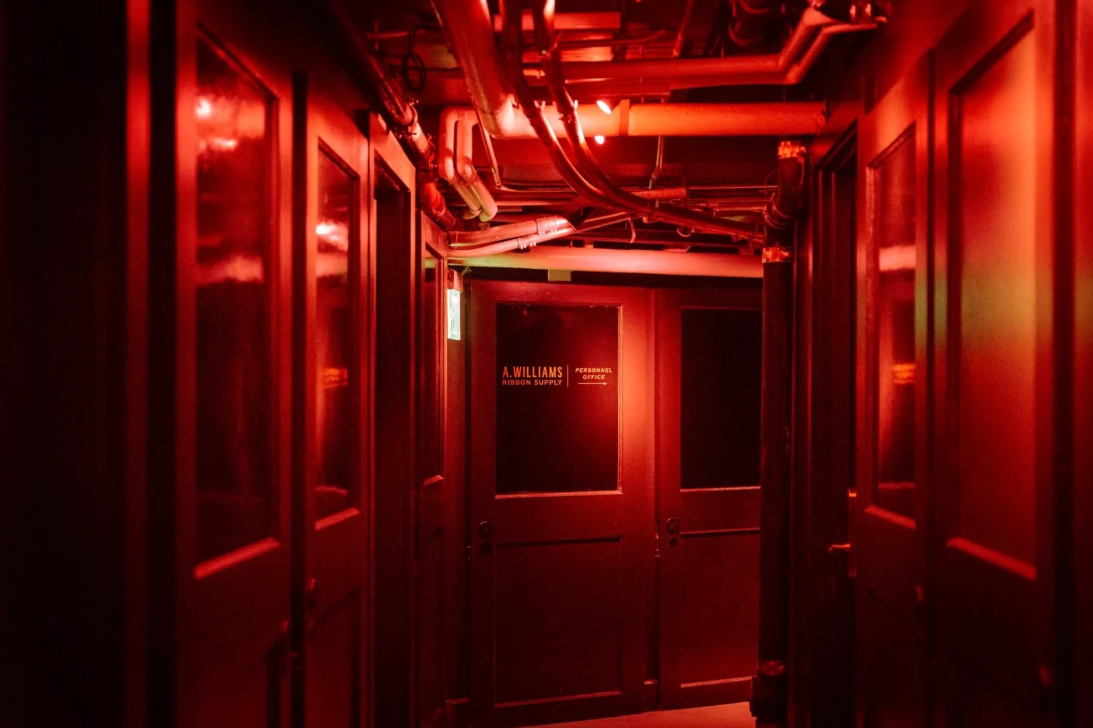 Dramatic neon corridor entrance with vintage speakeasy aesthetic