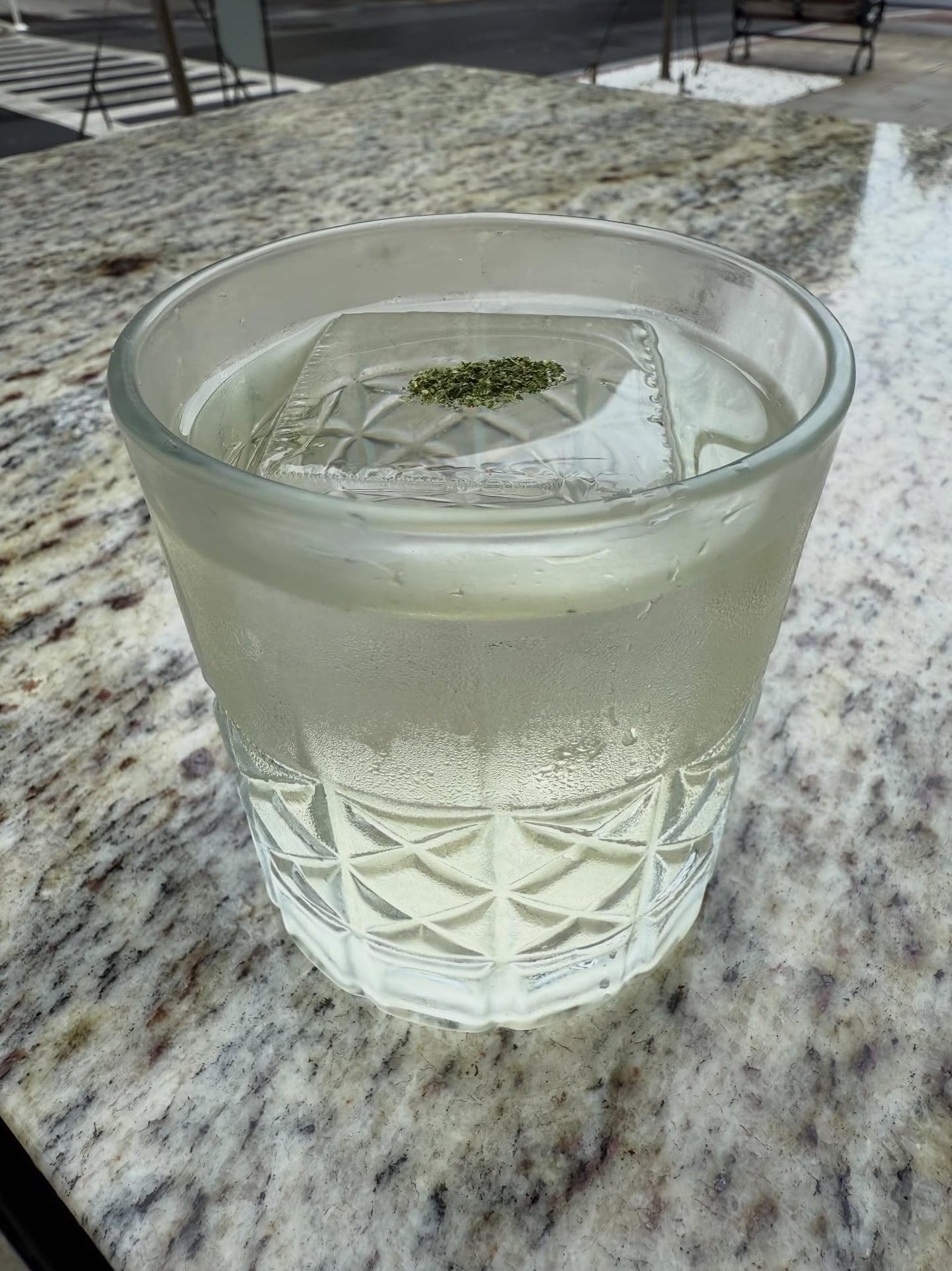 House cocktail with custom infused ice cube