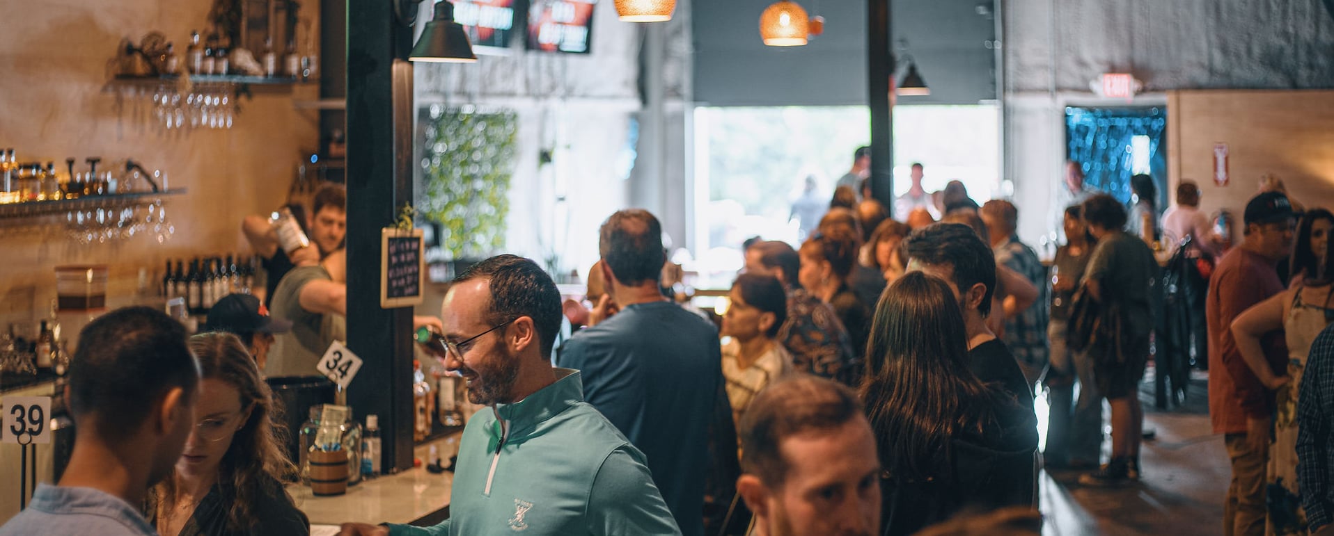 Bustling daytime atmosphere at the main bar