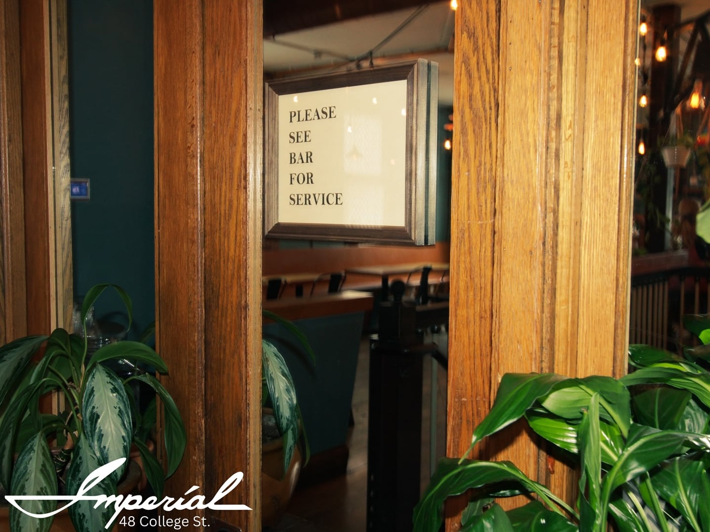 Entrance to the dining area with service signage visible inside.