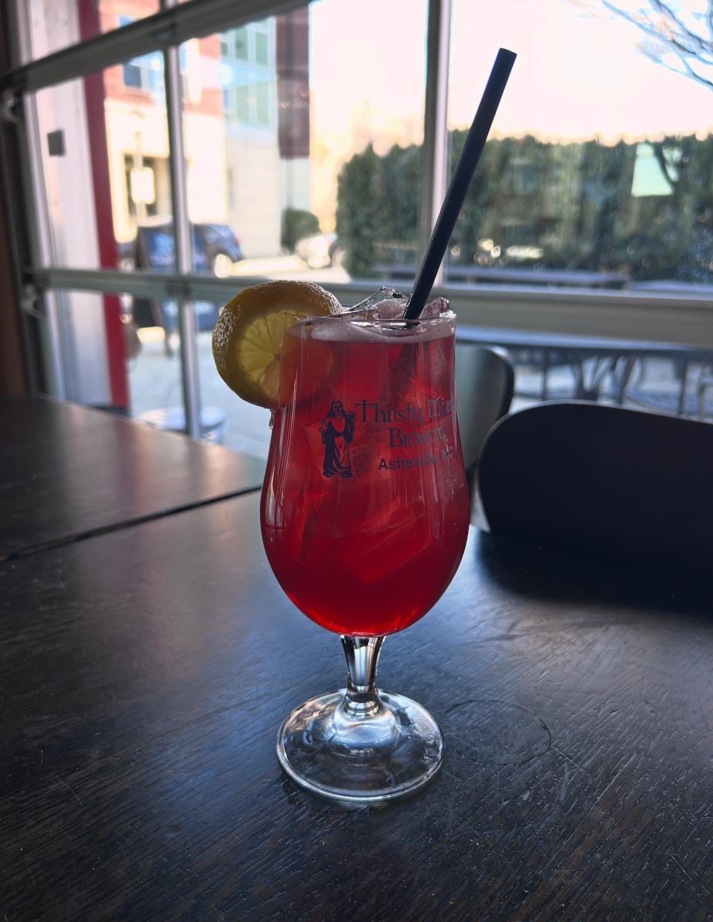 House cocktail with citrus garnish