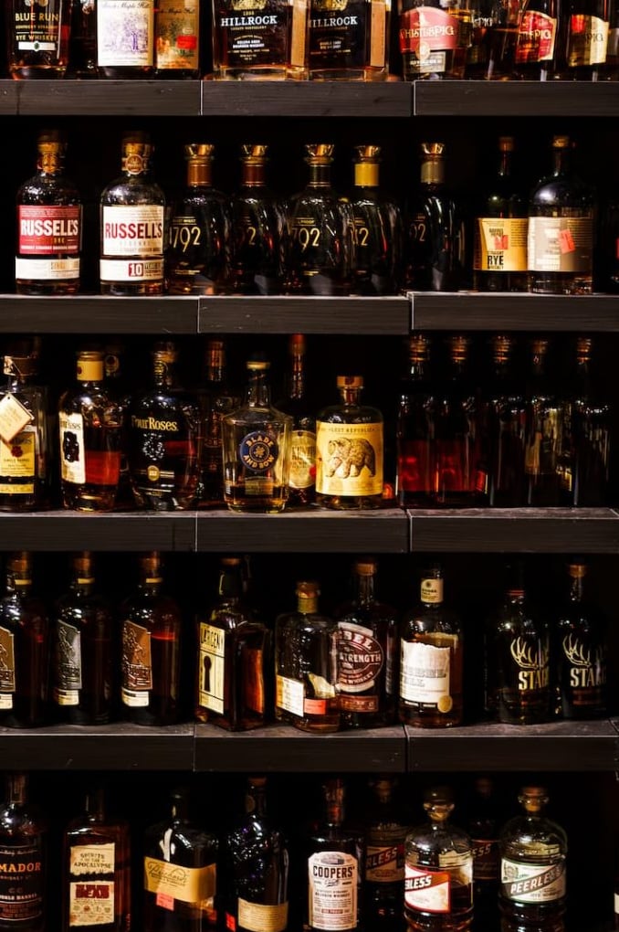 Well-stocked backbar featuring a wide selection of bourbons and whiskeys.