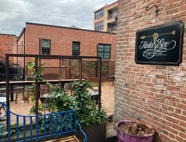 Hotel Eve signage at the hidden courtyard entrance on N Lexington Ave