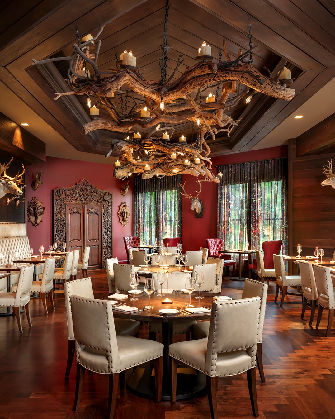 Signature antler chandelier in dining room