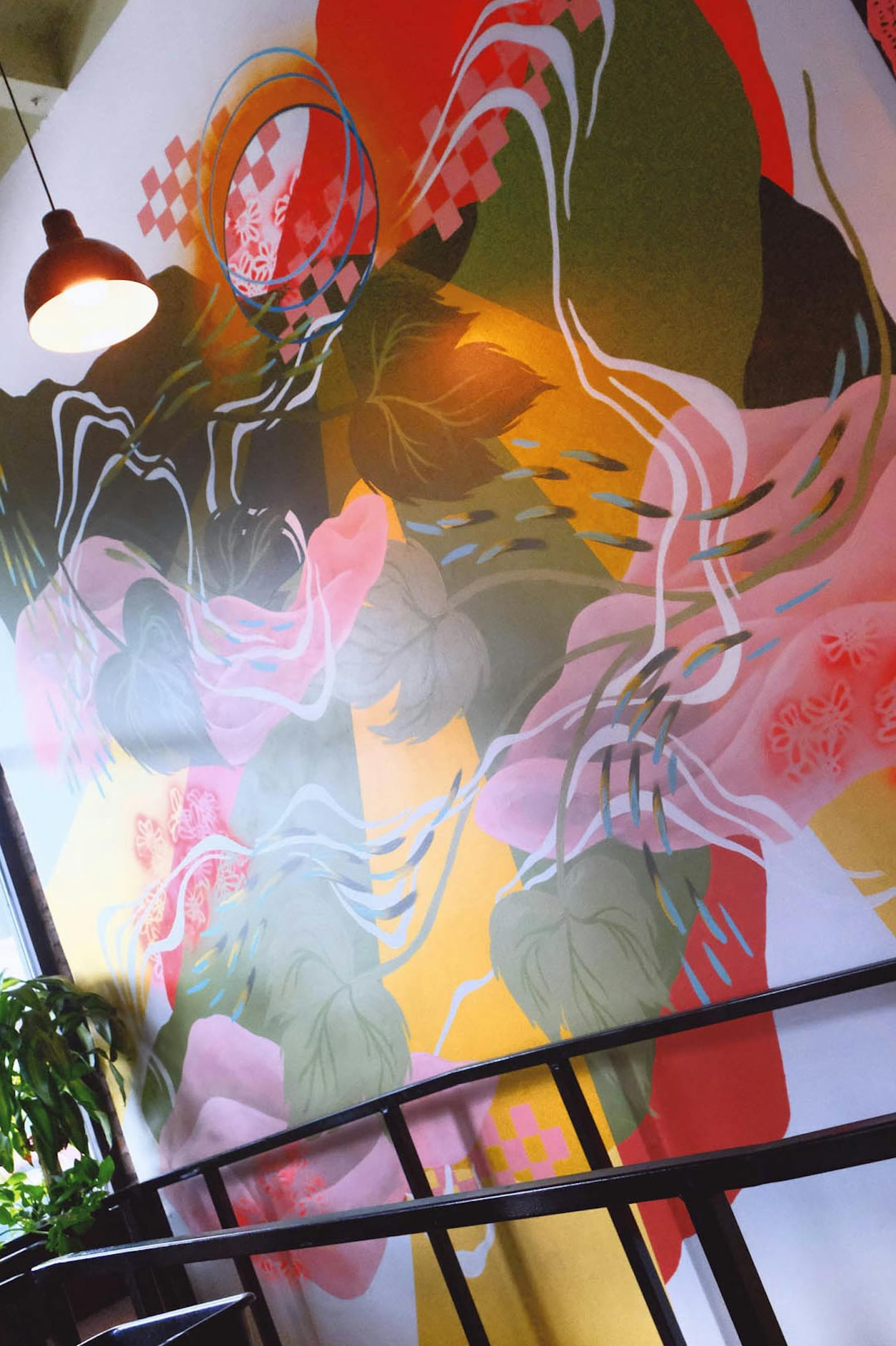 Large abstract mural with flowing multicolored figures