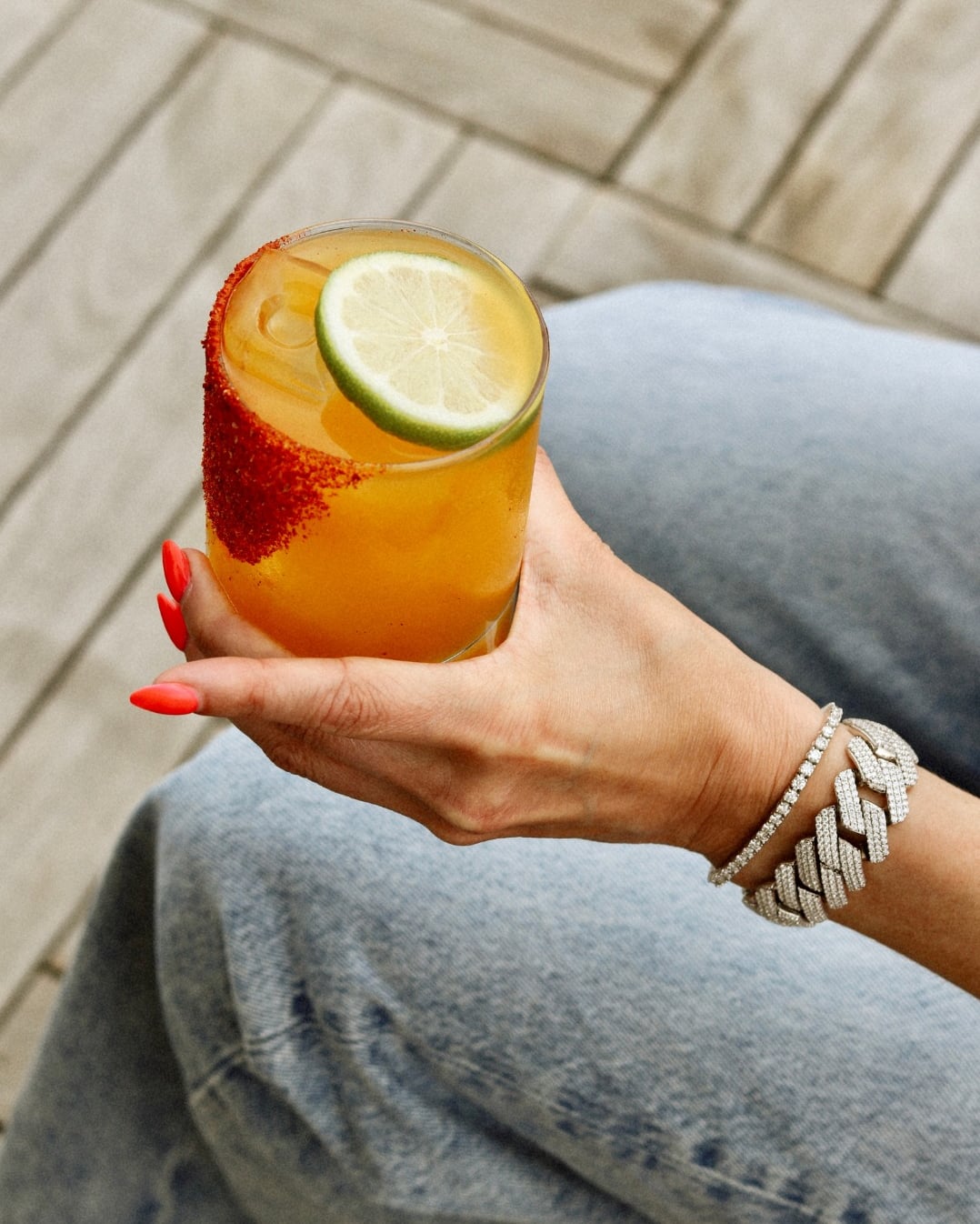 Signature cocktail with chili-spiced rim